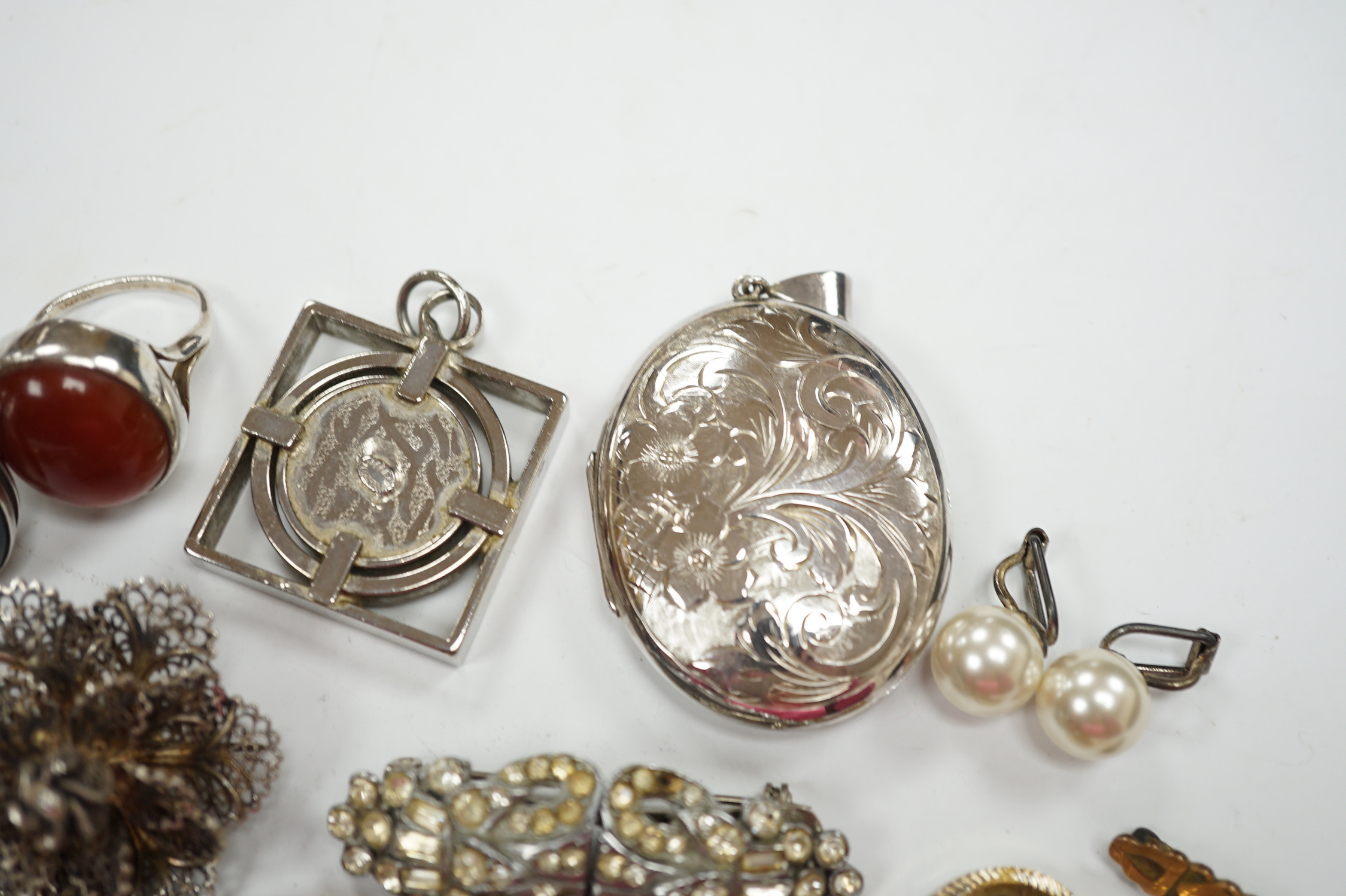 A silver and cabochon set dress ring, mixed costume jewellery and a lady's wrist watch.
